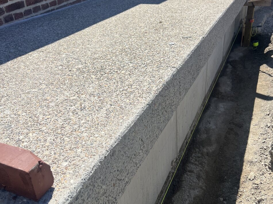 Detail van de korrelstructuur in uitgewassen beton